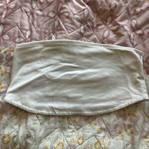 White cropped tube top and black off the shoulder mesh top